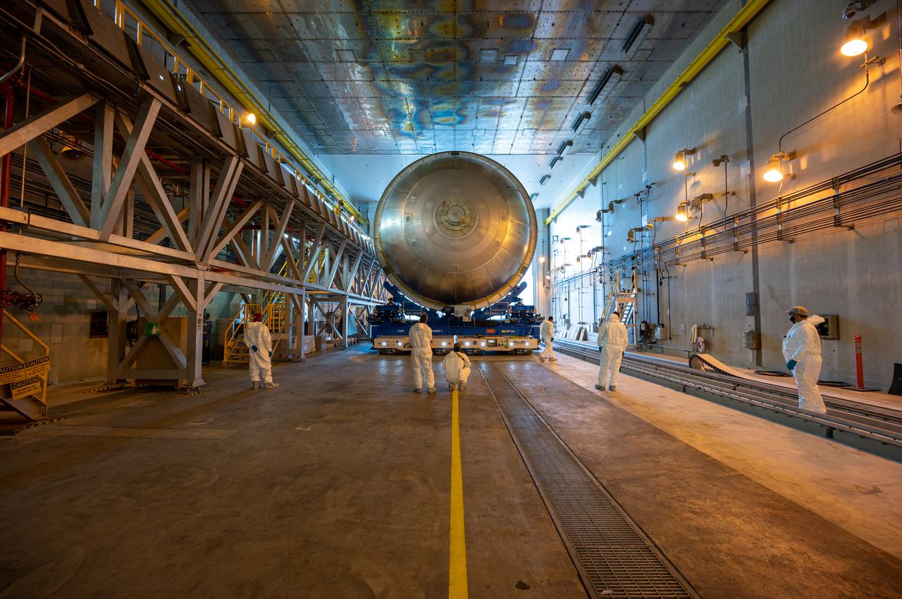 This image highlights the liquid oxygen tank, which will be used on the core stage of NASA’ Space Launch System rocket for Artemis II, the first crewed mission of NASA’s Artemis program, at NASA’s Michoud Assembly Facility. The SLS core stage is made up of five unique elements: the forward skirt, liquid oxygen tank, intertank, liquid hydrogen tank, and the engine section. The forward skirt houses flight computers, cameras, and avionics systems. The liquid oxygen tank holds 196,000 gallons of liquid oxygen cooled to minus 297 degrees Fahrenheit. The LOX hardware sits between the core stage’s forward skirt and the intertank. Along with the liquid hydrogen tank, it will provide fuel to the four RS-25 engines at the bottom of the core stage to produce more than two million pounds of thrust to launch NASA’s Artemis missions to the Moon.     Together with its four RS-25 engines, the rocket’s massive 212-foot-tall core stage — the largest stage NASA has ever built — and its twin solid rocket boosters will produce 8.8 million pounds of thrust to send NASA’s Orion spacecraft, astronauts and supplies beyond Earth’s orbit to the Moon and, ultimately, Mars. Offering more payload mass, volume capability and energy to speed missions through space, the SLS rocket, along with NASA’s Gateway in lunar orbit, the Human Landing System, and Orion spacecraft, is part of NASA’s backbone for deep space exploration and the Artemis lunar program. No other rocket can send astronauts in Orion around the Moon in a single mission.